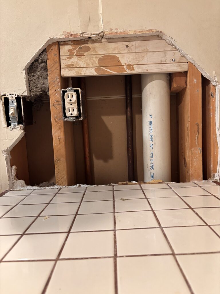 Here is the plumping up close. Three pipes would need to be moved. This is definitely something we would hire someone to do.